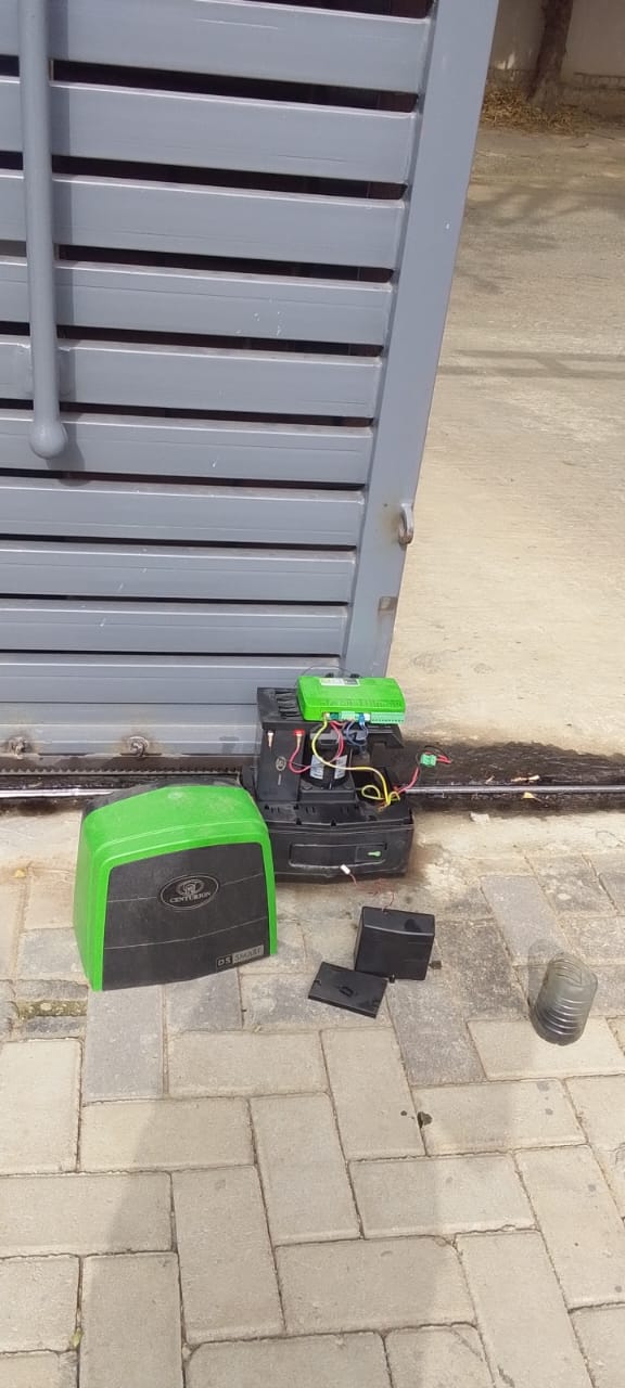 Gate motor installation in progress